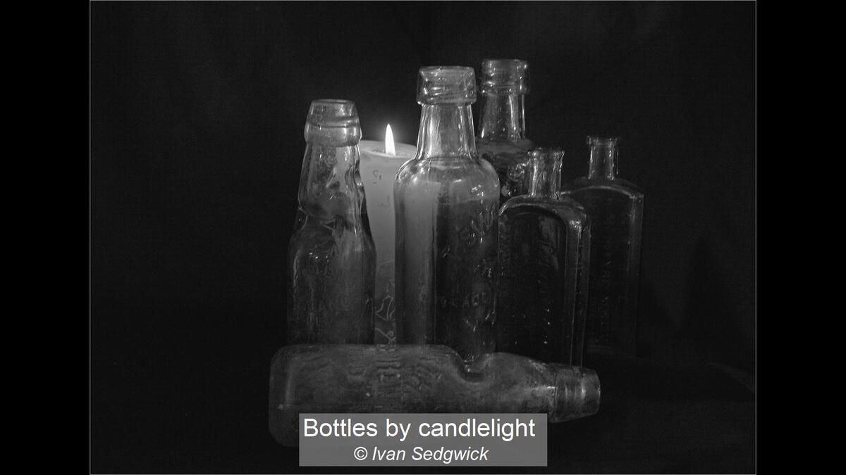 Bottles by candlelight